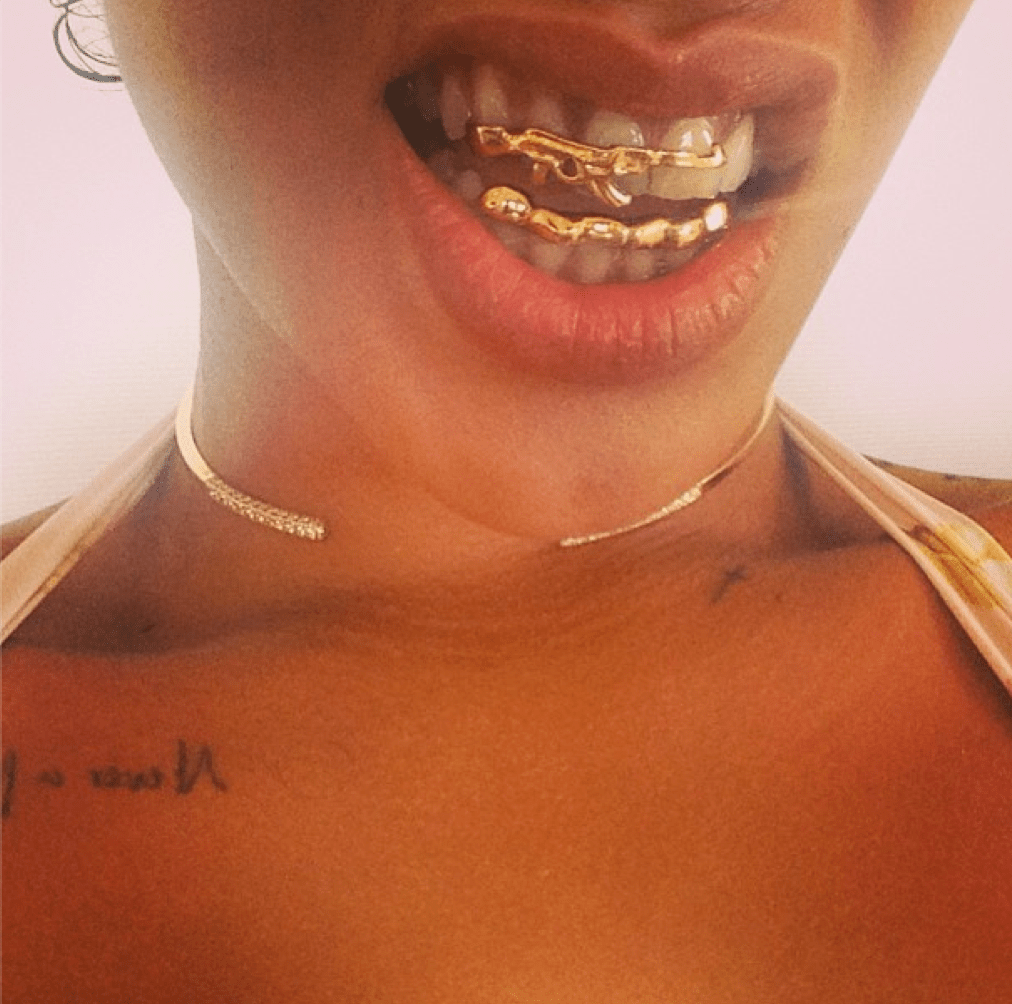 Rihanna Wears Grill in the Shape of a Gun