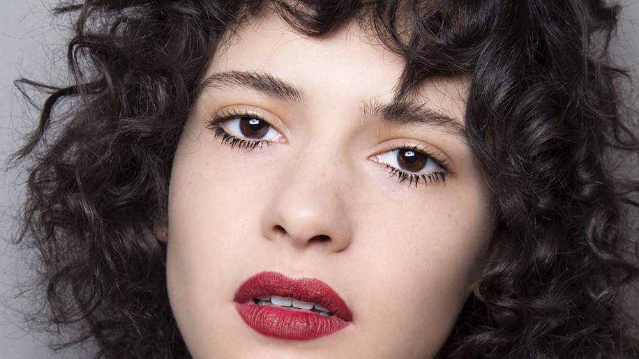 Yes, Curly Bangs Are Back—Here's How to Pull Them Off