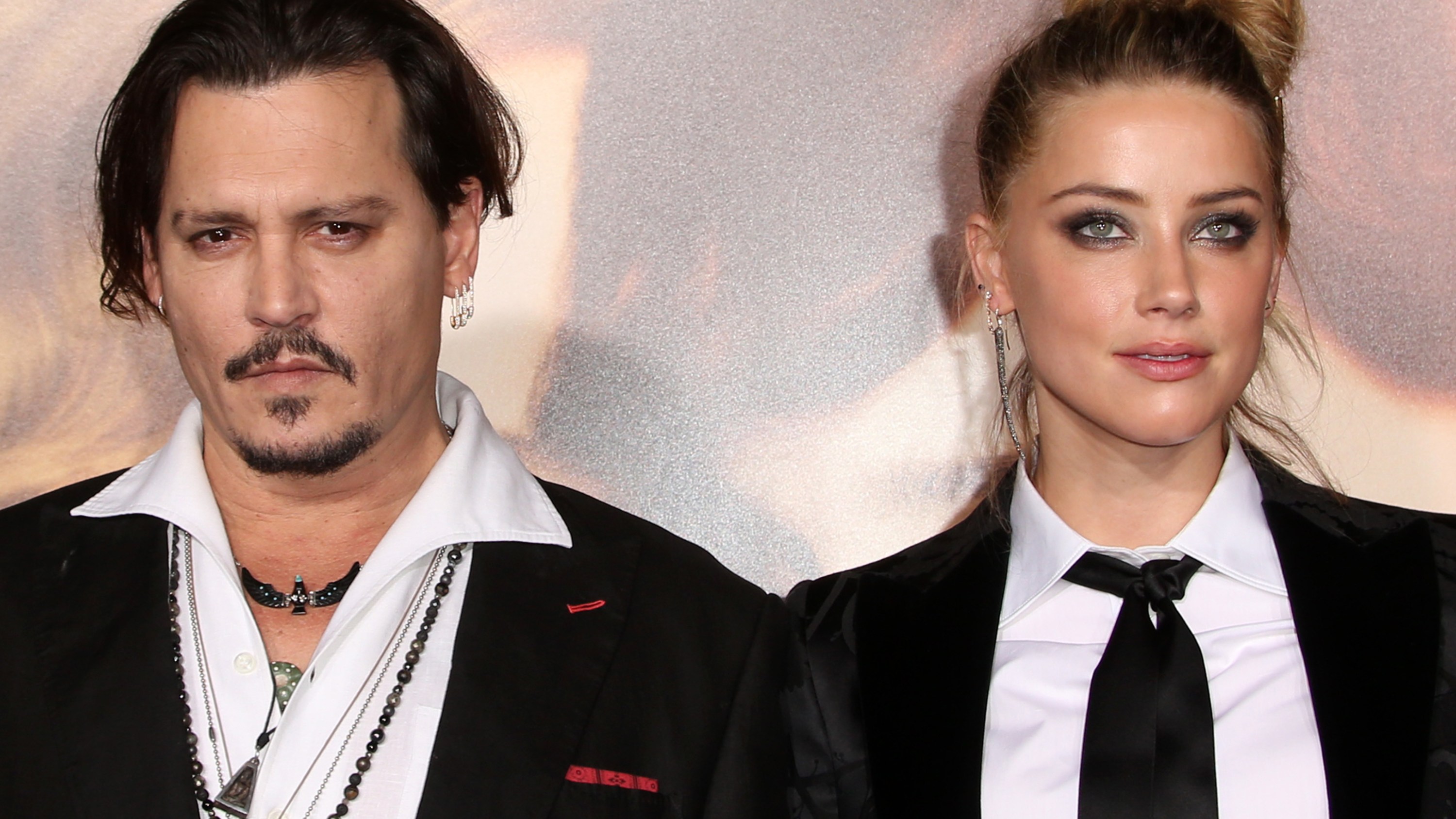 Amber Heard and Johnny Depp Settle Divorce, Scrap Domestic Violence Claims