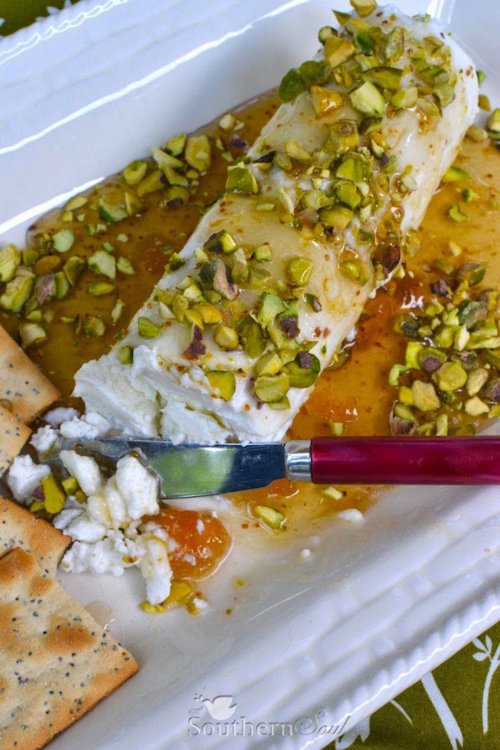 STYLECASTER | 25 Festive Recipes That Will Impress Your Friends on New Year’s Eve | Honey and Pistachio Goat Cheese Appetizer