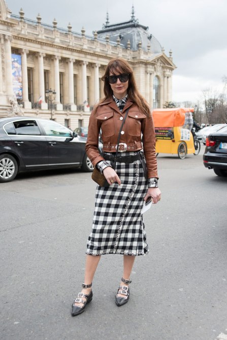 STYLECASTER | How to Wear Clashing Colors | Brown Leather Jacket and Black Picnic Print Dress