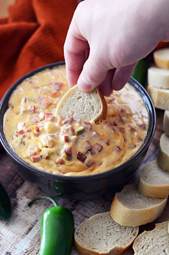 STYLECASTER | 17 Slow-Cooker Recipes to Whip Up During March Madness | Sweet Heat Kielbasa Dip