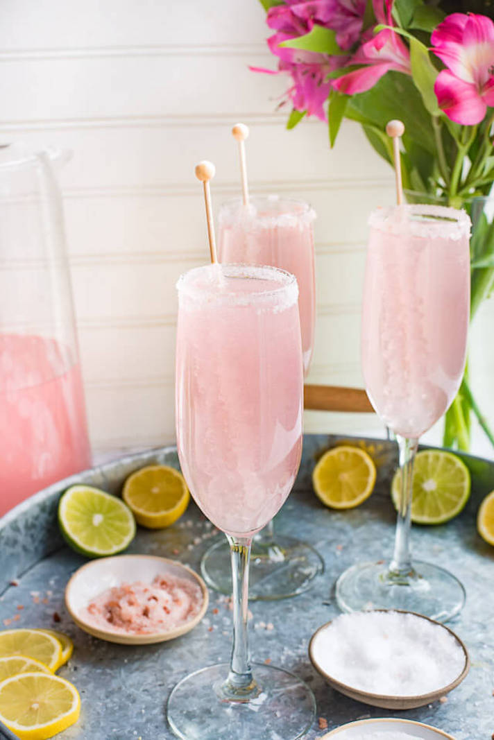 STYLECASTER | 17 Big-Batch Margarita Recipes So Good You'll Be Tempted to Whip 'Em Up Every Day This Summer | Pink Champagne Margaritas