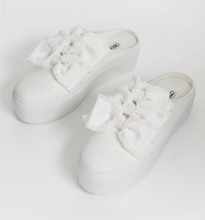 STYLECASTER | Dainty White Sneakers You Could Definitely Wear Under Your Bridal Gown