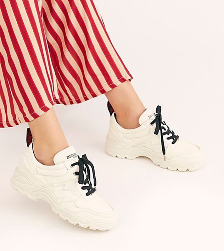 STYLECASTER | Dainty White Sneakers You Could Definitely Wear Under Your Bridal Gown