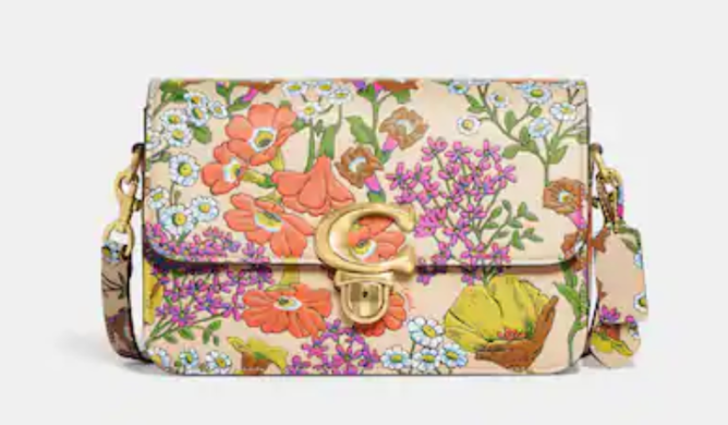 STYLECASTER | Jennifer Lopez Mothers Day Coach 