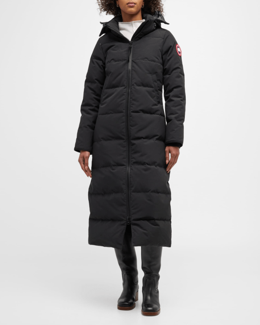 A model wearing the Canada Goose Mystique Parka in black