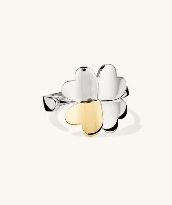 A silver four leaf clover ring, with one leaf lined with gold vermeil