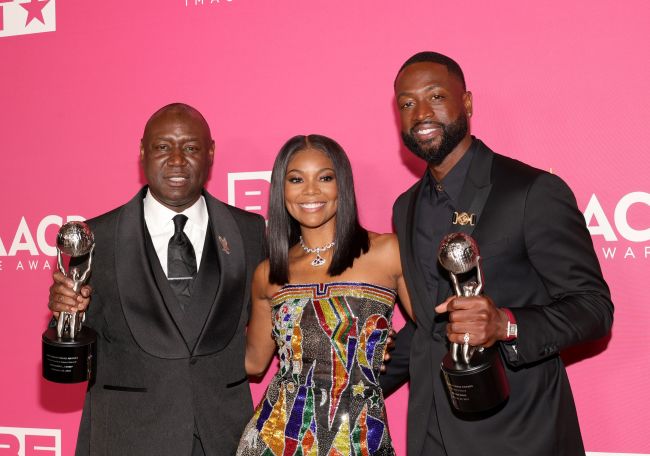 Honoree Benjamin Crump, recipient of the Social Justice Impact Award, and honorees Dwyane Wade and Gabrielle Union, recipients of the President's Award, pose in the press room during the 54th NAACP Image Awards.