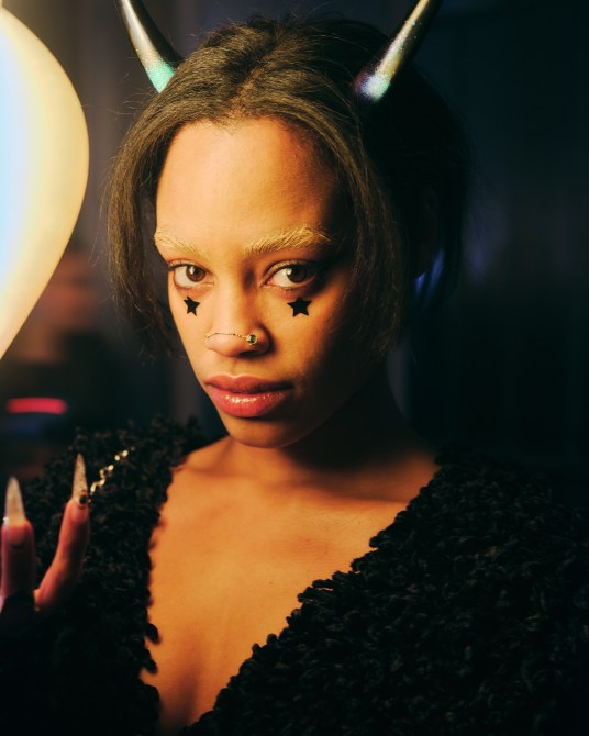 A model at the LUAR runway show wearing Starface's Earth Star ahead of official launch.