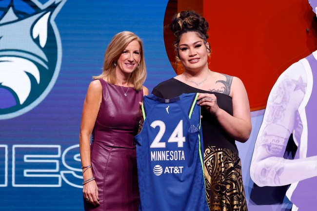 NEW YORK, NEW YORK - APRIL 15: Alissa Pili poses with WNBA Commissioner Cathy Engelbert after being selected eighth overall pick by the Minnesota Lynx during the 2024 WNBA Draft at Brooklyn Academy of Music on April 15, 2024 in New York City.