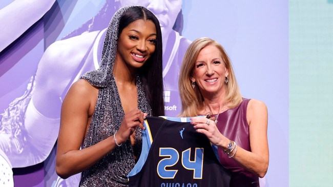 NEW YORK, NEW YORK - APRIL 15: Angel Reese poses with WNBA Commissioner Cathy Engelbert after being selected seventh overall pick by the Chicago Sky during the 2024 WNBA Draft at Brooklyn Academy of Music on April 15, 2024 in New York City.