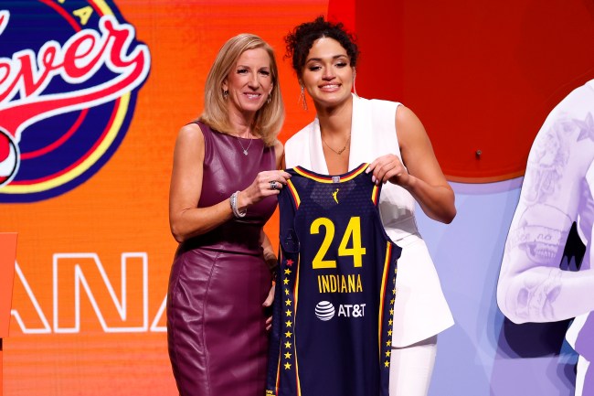 NEW YORK, NEW YORK - APRIL 15: Celeste Taylor (R) poses with WNBA Commissioner Cathy Engelbert (L) after being selected 15th overall pick by the Indiana Fever during the 2024 WNBA Draft at Brooklyn Academy of Music on April 15, 2024 in New York City.