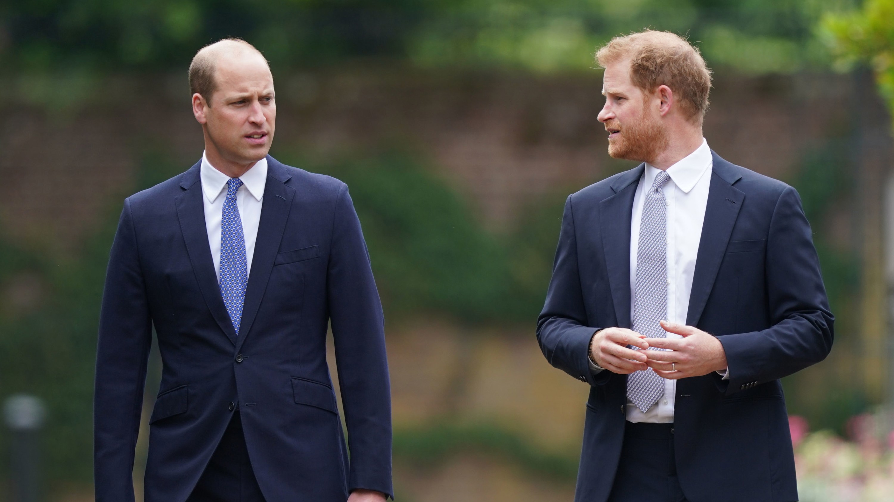 Prince William, Duke of Cambridge (left) and Prince Harry, Duke of Sussex arrive for the unveiling of a statue they commissioned of their mother Diana, Princess of Wales, in the Sunken Garden at Kensington Palace, on what would have been her 60th birthday on July 1, 2021 in London, England. Today would have been the 60th birthday of Princess Diana, who died in 1997. At a ceremony here today, her sons Prince William and Prince Harry, the Duke of Cambridge and the Duke of Sussex respectively, will unveil a statue in her memory.