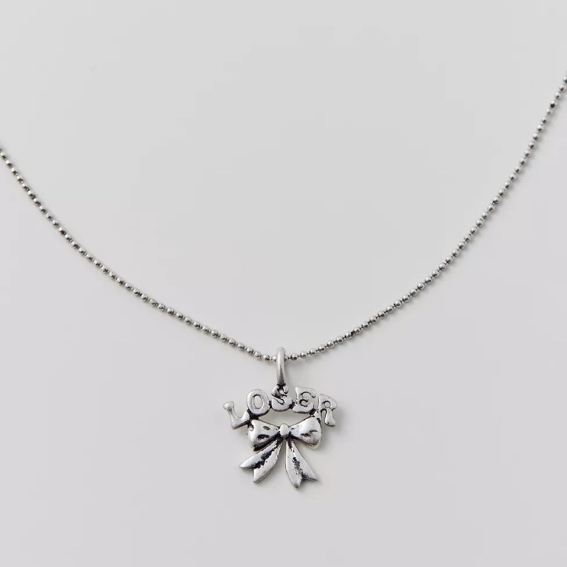 Jewelry Trends 2024: Hearts, Wabi Sabi, & Charm Bracelets for Summer