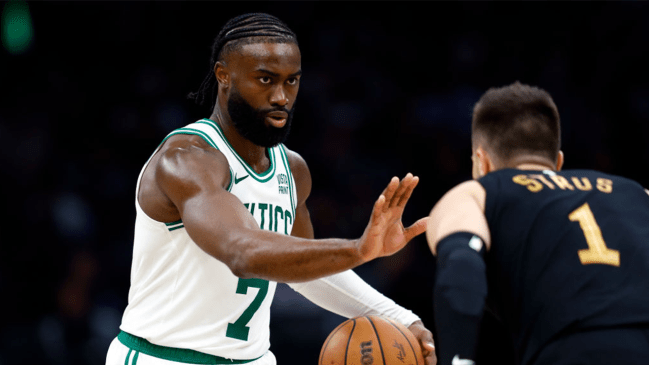 Boston Celtics guard Jaylen Brown goes up against Cleveland Cavaliers guard Max Strus in the fourth quarter.