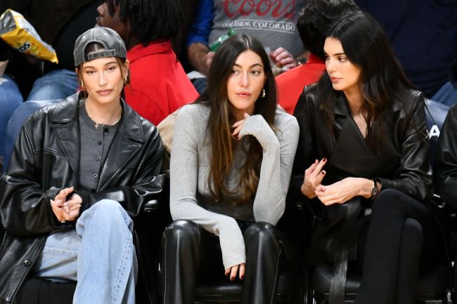 Hailey Bieber, Sarah Staudinger and Kendall Jenner attend a basketball game between the Los Angeles Lakers and the Oklahoma City Thunder at Crypto.com Arena on January 15, 2024 in Los Angeles, California.