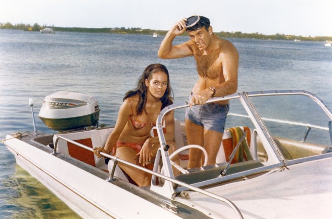 Actor Sean Connery and actress Martine Beswick on the set of "Thunderball".