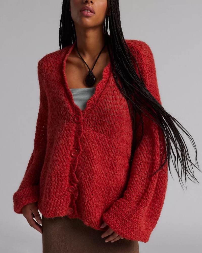 Sweater Trends 2024: Messy Knits, Sweater Paws, & More