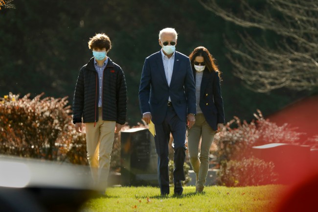 President-elect Joe Biden, center, visits the grave of his son Beau Biden after attending church at St. Joseph on the Brandywine Roman Catholic Church in Wilmington, Delaware on Nov.8, 2020. Accompanying Biden is his grandson Hunter Biden, left, son of Beau Biden, and Ashley Biden, right.