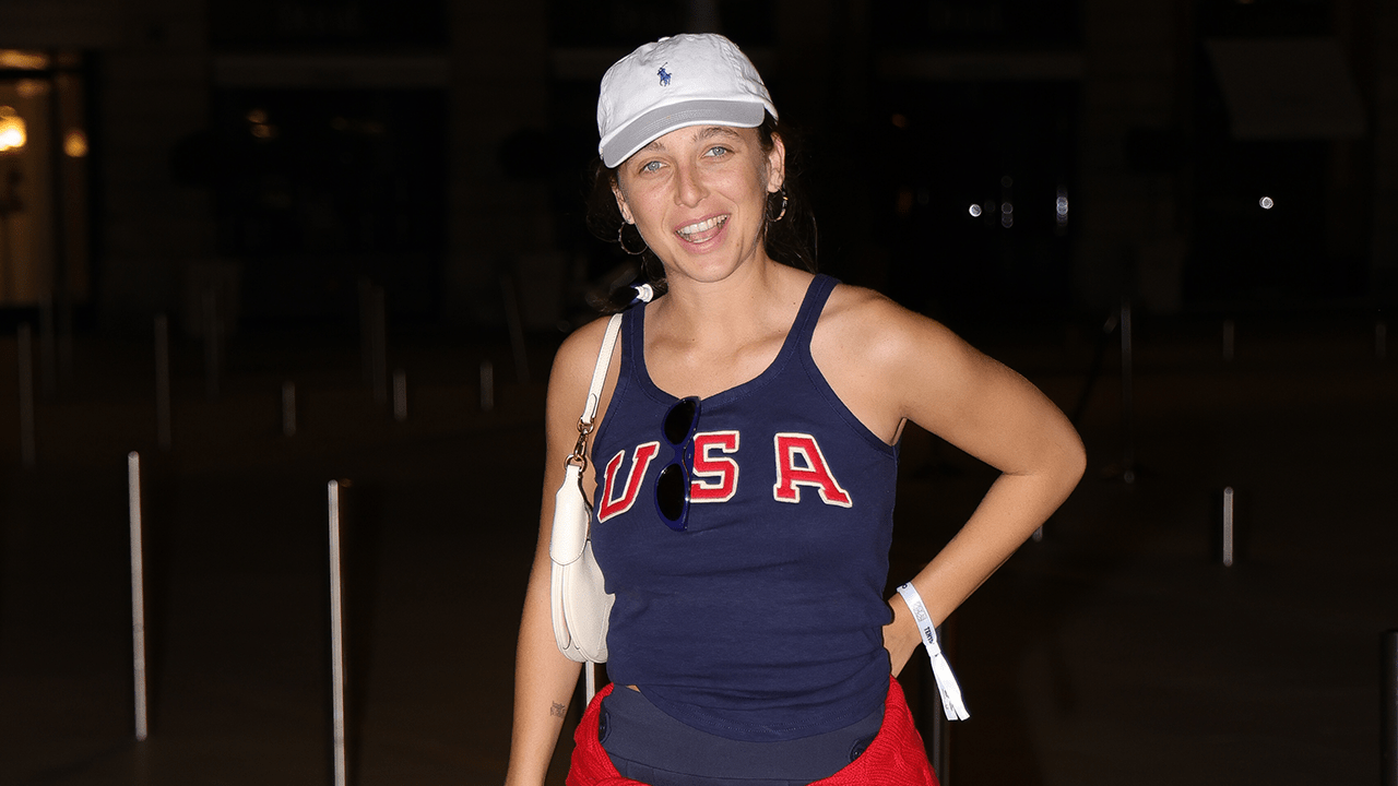 Emma Chamberlain wearing a Ralph Lauren USA tanktop.