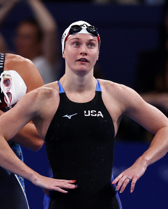 NANTERRE, FRANCE - JULY 27: Abbey Weitzeil and Erika Connolly  of Team United States react during the Women's 4x100m Freestyle Relay Heats on day one of the Olympic Games Paris 2024 at Paris La Defense Arena on July 27, 2024 in Nanterre, France.