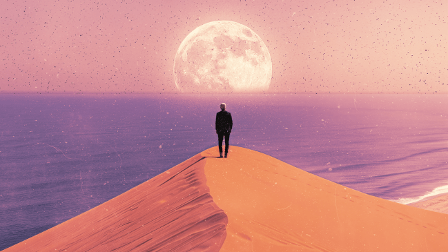 A man standing on the edge of a cliff, overlooking the ocean toward and the full moon in Cancer