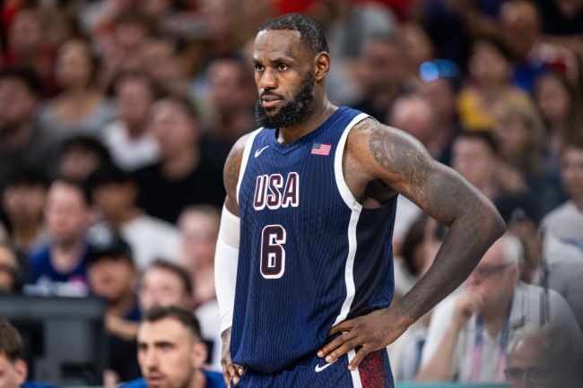 LeBron James of USA looks on while the group stage match between Serbia and USA on day two of the Olympic Games Paris 2024 at Stade Pierre Mauroy on July 28, 2024 in Lille, France.