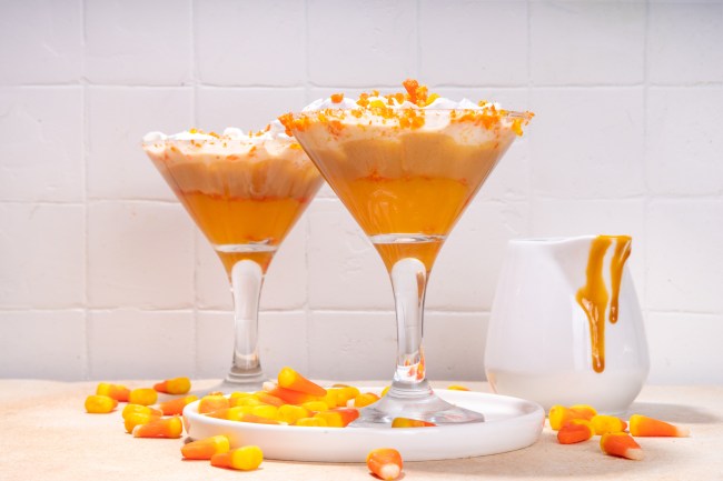Candy corn martini drink. Sweet and salty pumpkin caramel cocktail, with candy corn sweets