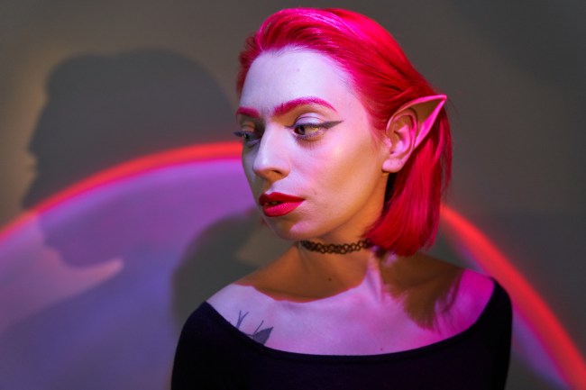 A woman wears futuristic makeup