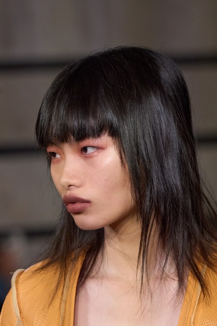 A model with blurred lips.