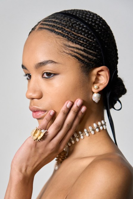 A model with natural short nails.