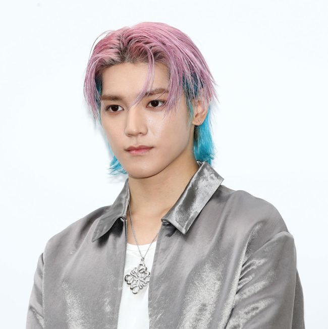 Taeyong of boy band NCT 127 is seen at the 'LOEWE' 2023 F/W collection on August 22, 2023 in Seoul, South Korea.