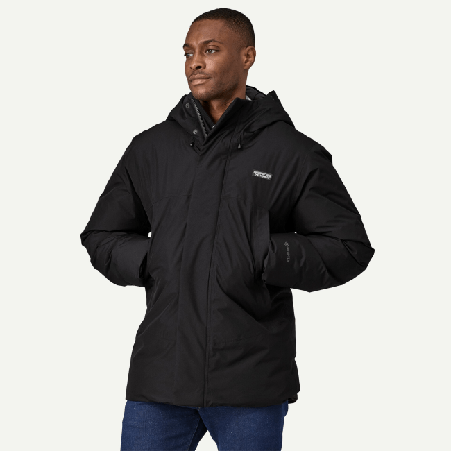 A model wearing the Patagonia Men's Stormshadow Parka in black