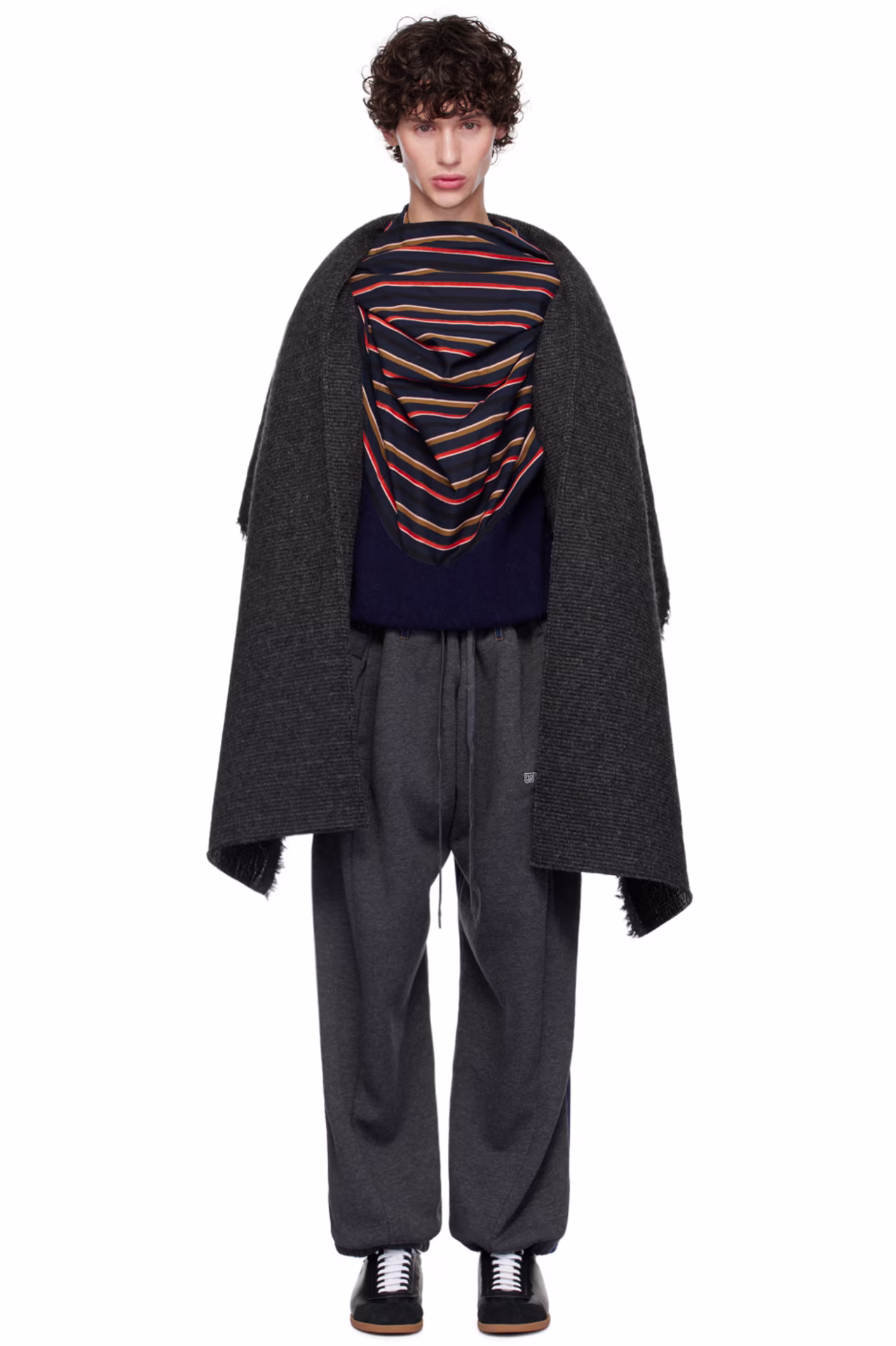 Men's Coat Trends 2025: Belted Trenches, Maxis, & Capes