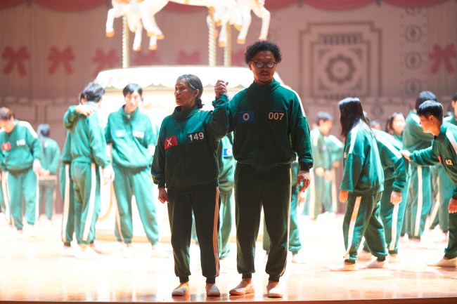 Squid Game S2 (L to R) Kang Ae-sim as Jang Geum-ja, Yang Dong-geun as Park Yong-sik in Squid Game