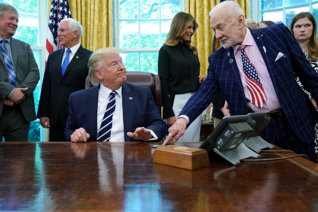 WASHINGTON, DC - JULY 19: Apollo 11 astronaut Buzz Aldrin (R) talks with U.S. President Donald Trump as they commemorate the 50th anniversary of the moon landing in the Oval Office at the White House July 19, 2019 in Washington, DC. The first man to walk on the moon, Neil Armstrong, died in 2012.
