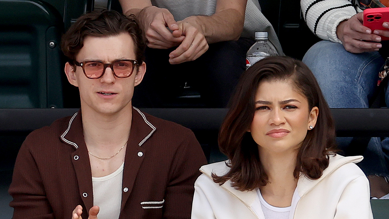 Tom Holland and Zendaya watch Carlos Alcaraz of Spain play Daniil Medvedev of Russia during the Men's Final of the BNP Paribas Open at Indian Wells Tennis Garden on March 17, 2024 in Indian Wells, California.
