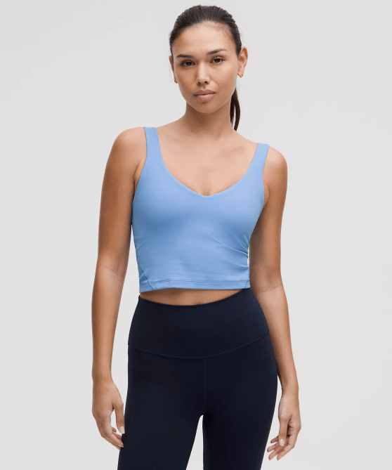 A model wearing the Lululemon Align Tank Top Light Support, A/B Cup in a sky blue colorway