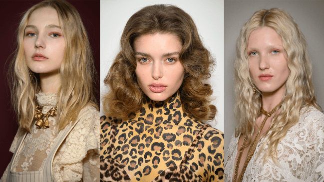 Models wearing orange eyeshadow.