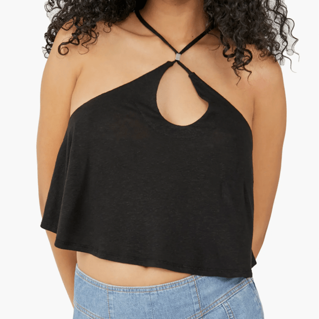 A model wearing the Free People Long Weekend Knit Halter Tank.