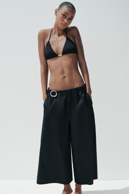 A model wearing the Zara Culottes in black
