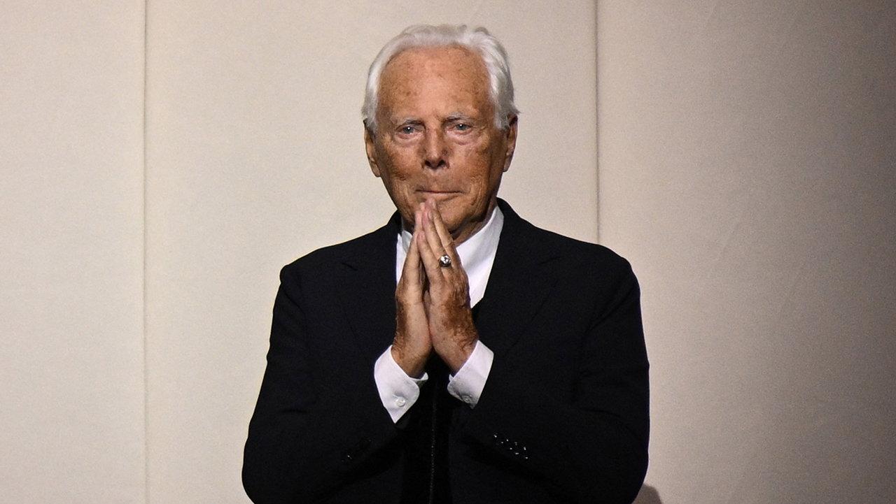 TOPSHOT - Italian fashion designer Giorgio Armani acknowledges the audience at the end of the Giorgio Armani Prive show as part of the Women's Haute-Couture Fall/Winter 2023/2024 Fashion Week in Paris on July 4, 2023.