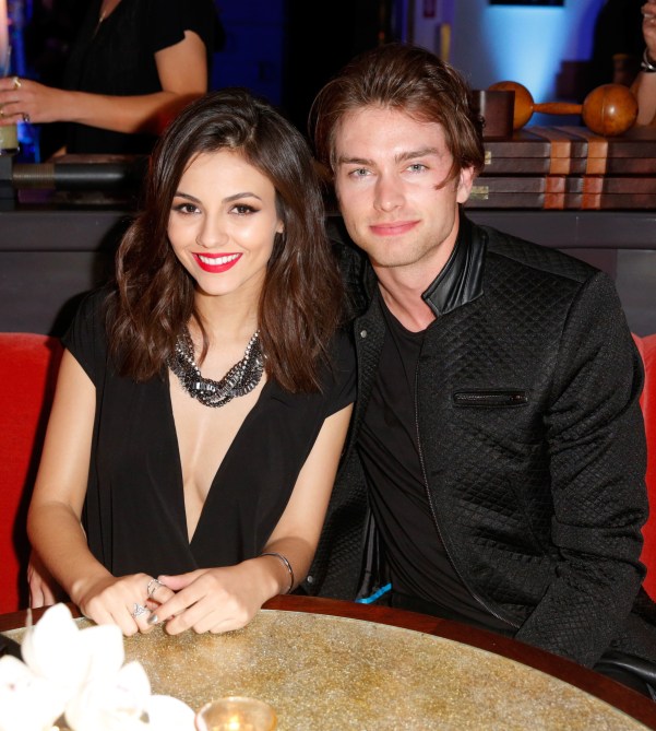 WEST HOLLYWOOD, CA - FEBRUARY 05:  Actress/singer Victoria Justice (L) and Pierson Fode attends a celebration of the 57th annual GRAMMY Awards hosted by Delta Air Lines, the official airline of the GRAMMY Awards, with a private performance from Charli XCX on February 5, 2015 in West Hollywood, California.