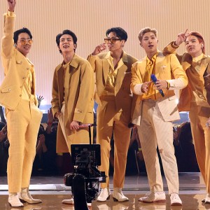 LOS ANGELES, CALIFORNIA - NOVEMBER 21: (L-R) Jimin, J-Hope, Jin, Jungkook, RM, Suga, and V of BTS perform onstage during the 2021 American Music Awards at Microsoft Theater on November 21, 2021 in Los Angeles, California.