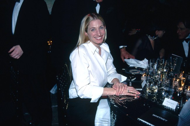 Carolyn Bessette Kennedy in a white button-down shirt