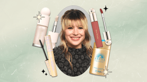 A collage with a close-up photo of Alysa Liu at the 2026 Vanity Fair Oscar Party surrounded by beauty products she uses (Rare Beauty liquid highlighter, Tarte mascara, Rare Beauty lip oil, and Anessa sunscreen).