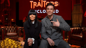 The Traitors host Claudia Winkleman and The Traitors: Uncloaked host Ed Gamble sitting next to each other on set for The Traitors: Uncloaked official visualized podcast